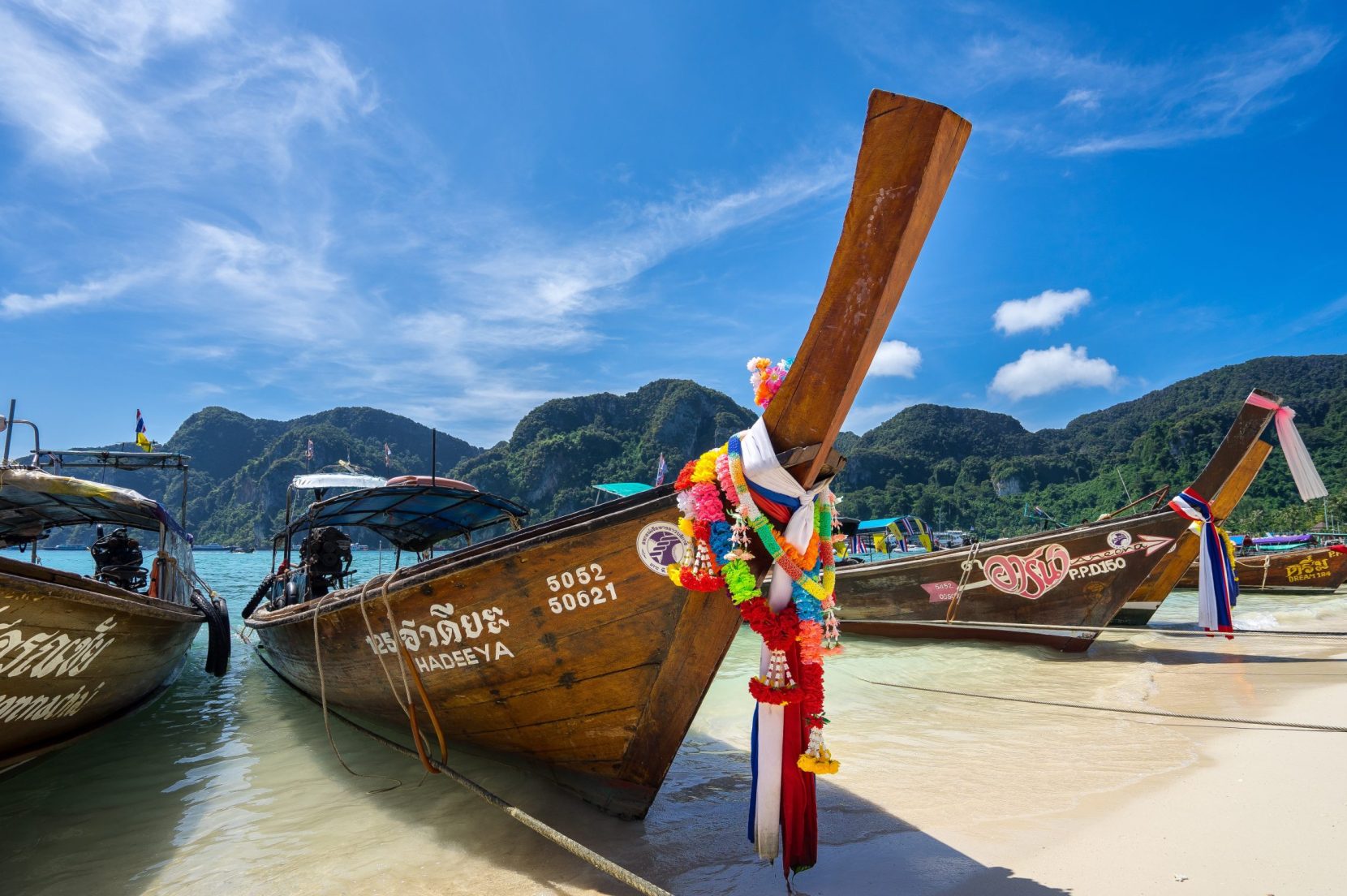Boats parked on the beaches of Pattaya